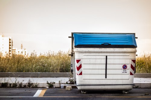 Operatives sorting commercial waste bins